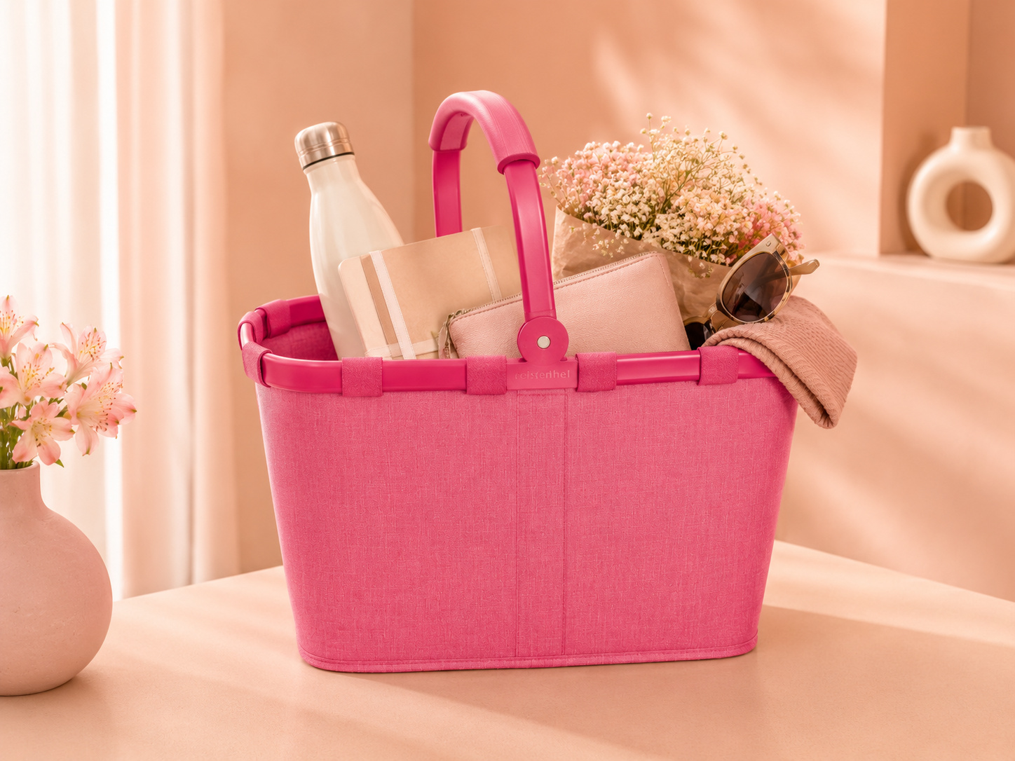 zu sehen ist eine pinke/rosane reisenthel carrybag
